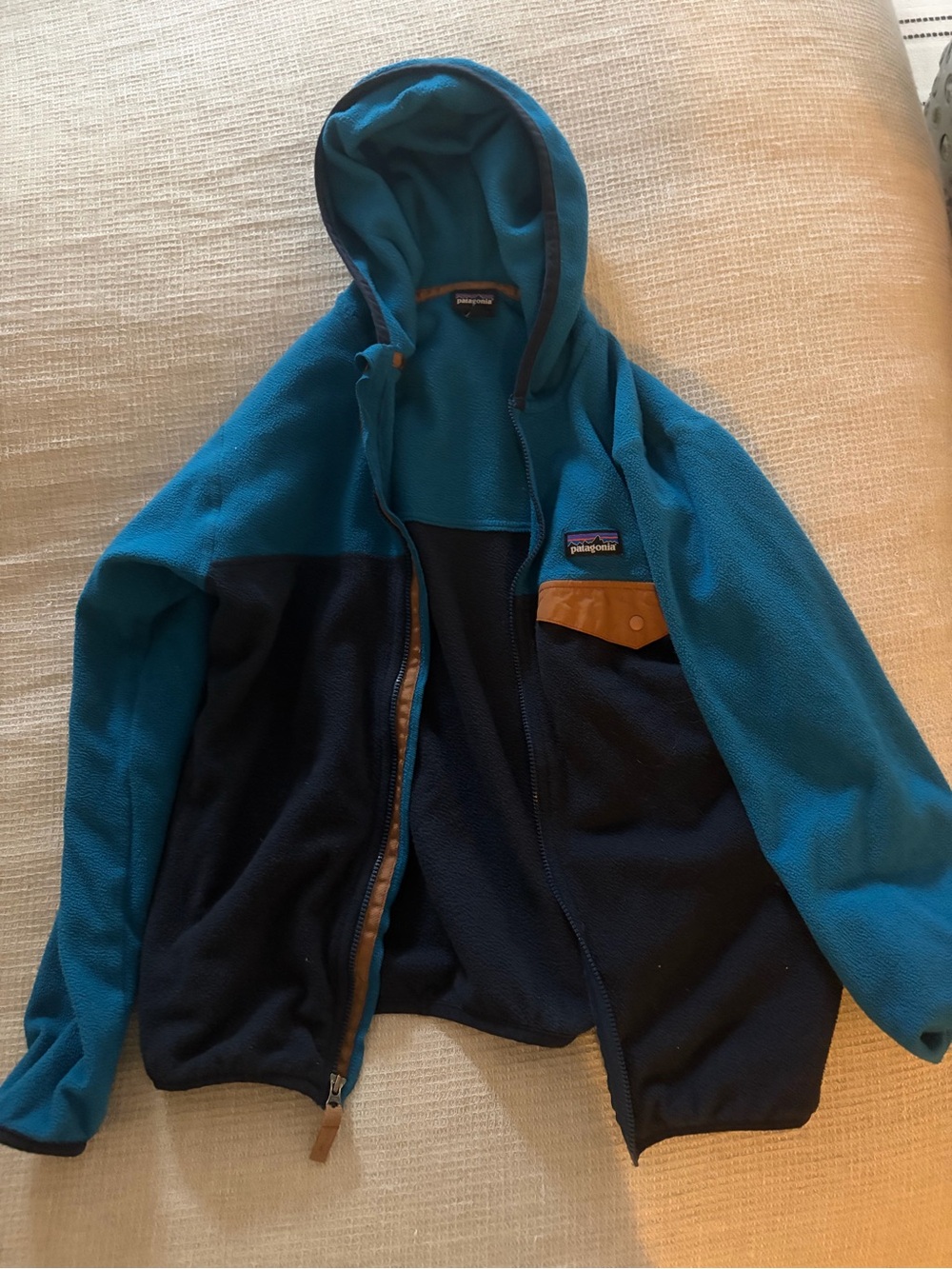 Patagonia Teal and Navy Fleece Jacket with Brown Pocket Accent
